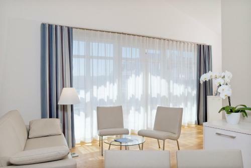 Nymphe Strandhotel & Apartments