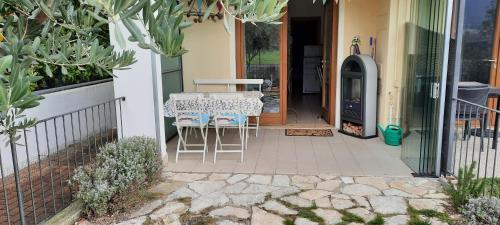 Apartamento Carlino Appartamento Giardino E Piscina