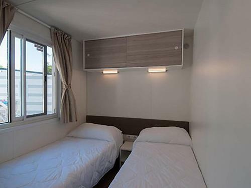 Attractive Mobile Home In Sorso With Shared Pool