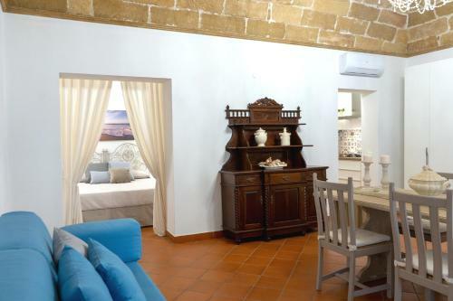 Apartamento Capo Rama Suites & Rooms