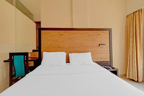 Capital O 87566 Hotel M B Residency
