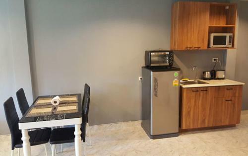 Oasis Apartments & Bar