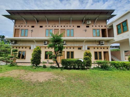 Hotel Oyo 90945 Arizon Kost