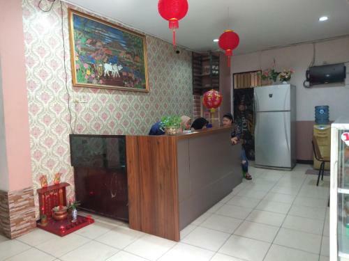 Hostal First Inn Hotel