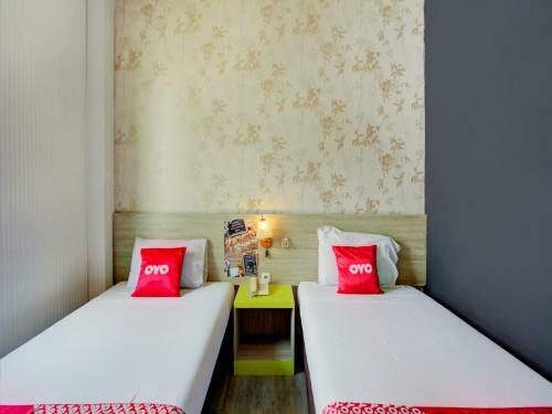 Capital O 4002 Aleander Hotel