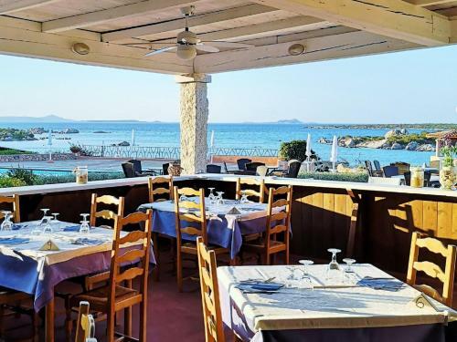 Lovely Holiday Home In Marinella With Shared Garden