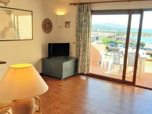 Cosy Holiday Home In Marinella With Shared Pool
