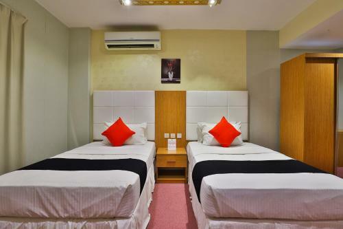 Capital O 338 Asian Hotel