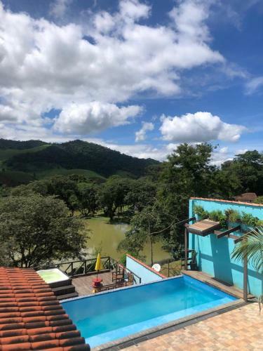 Hostal Aconchego Su�tes