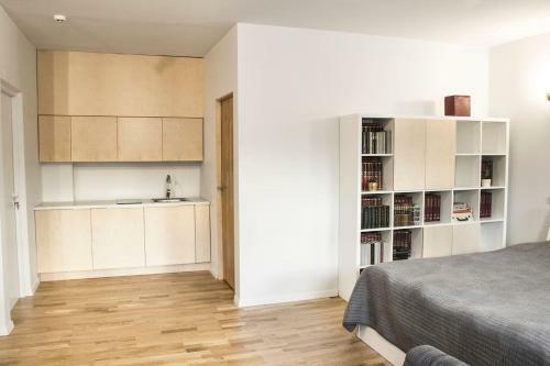Apartamento Mini Home Bookshop Studios