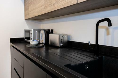 Contemporary Bolton Apartment In Central Location