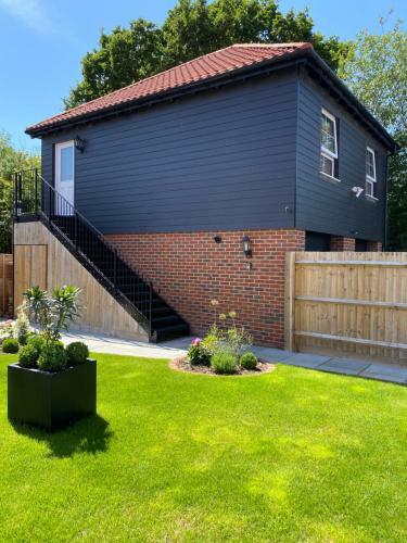 Apartamento Stansted Coach House