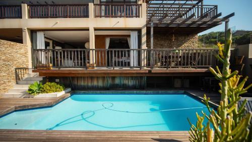 4 Dolphin Views, La Mercy Luxury Beachfront Apartmnet