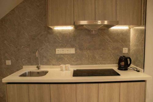 Aparthotel Haikou Sweet Apartment