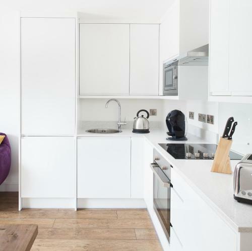 Apartamento Swanky Suites On The Marina