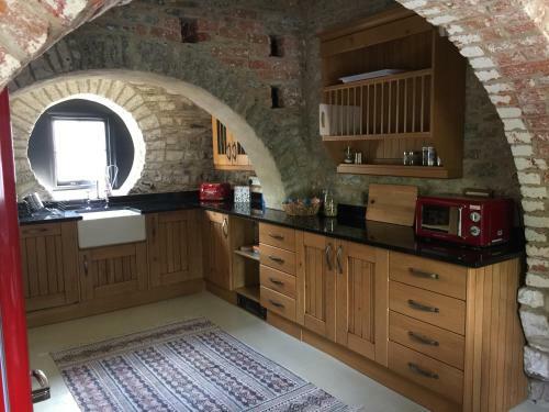 Apartamento The Stable Loft, Llwynhelig Manor