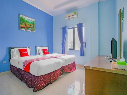 Hotel Oyo 90072 Apri Inn Syariah