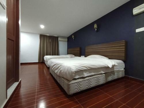 Hotel Oyo Home 90248 Kapitan Inn