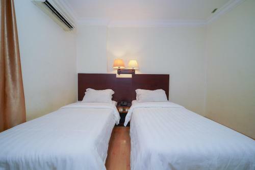 Capital O 89658 Bustani Hotel