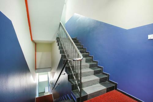 Oyo 89332 De Hotel
