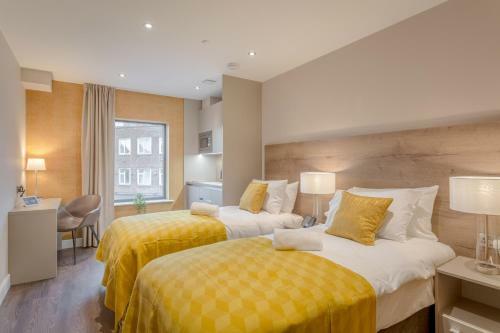 Aparthotel Dwell City Living