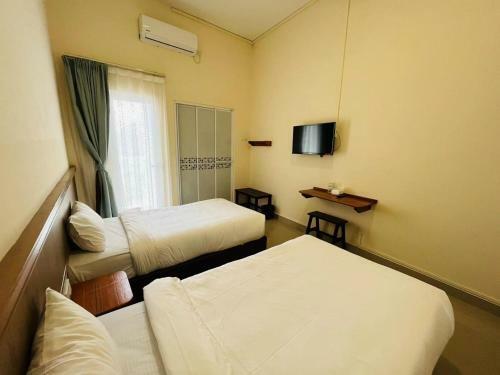 Apartamento Alexis Kt Roomstay