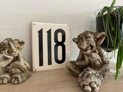 Den 118, Aan de Maas