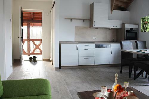 Apartamento Ferienwohnungen Zum Baumhaus