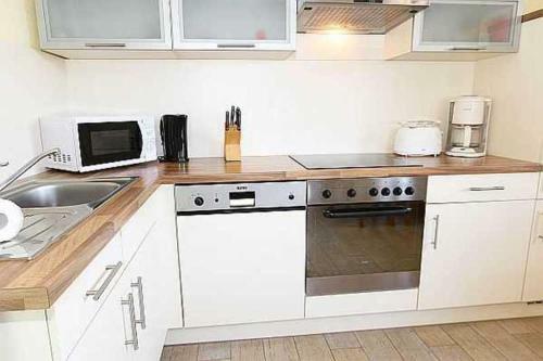 Apartamento Haus Am Deich Feriendomizil Mit Terrasse