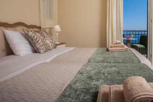 Luxury Villa Above Emblisi Beach , With Heated Pool !