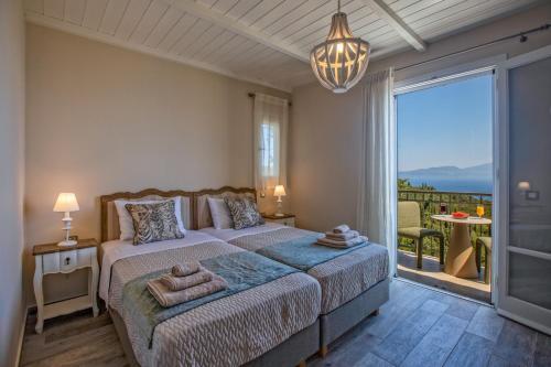 Luxury Villa Above Emblisi Beach , With Heated Pool !