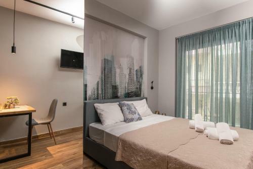 Apartamento Tzes City Suites
