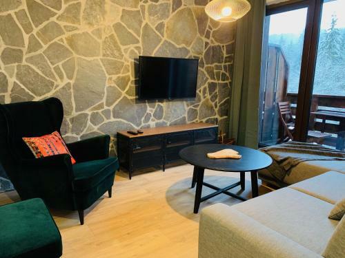 L�?nica Apartments T�le