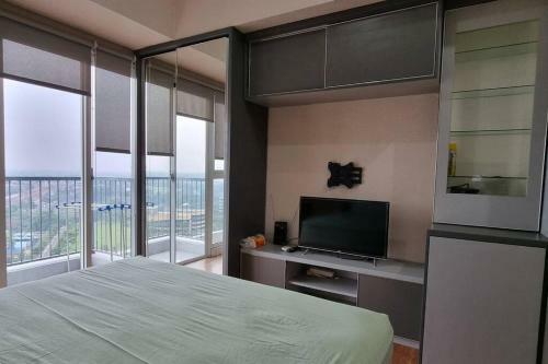 Apartemen Studio Casa de Parco Tema Gray