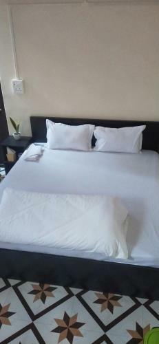 Oyo 87714 Thangal Hotel