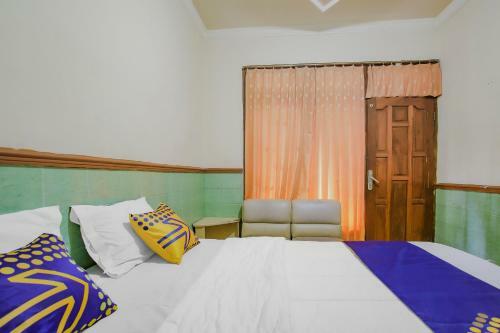 Spot On 90092 Dewi Safitri Hotel