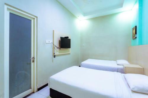 Hostal Ardhya Guesthouse Syariah By Ecommerceloka
