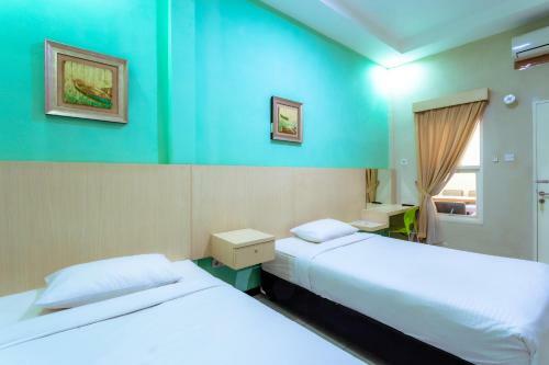 Hostal Ardhya Guesthouse Syariah By Ecommerceloka