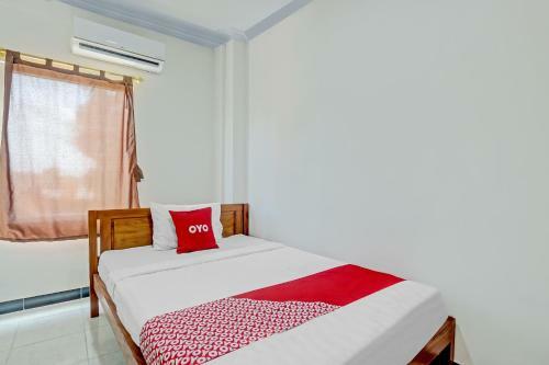 Hotel Oyo 90636 Happy Syariah