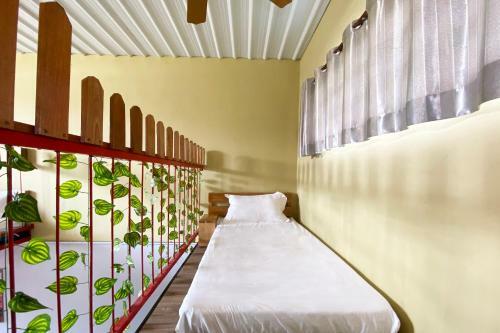 Oyo Home 90312 Rainbow Guesthouse