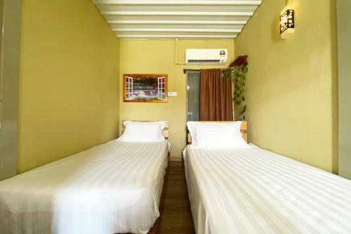 Oyo Home 90312 Rainbow Guesthouse