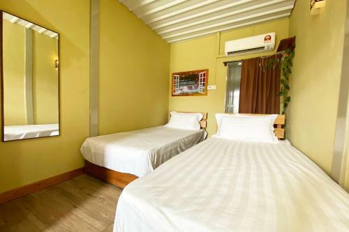 Oyo Home 90312 Rainbow Guesthouse