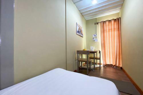 Oyo Home 90312 Rainbow Guesthouse
