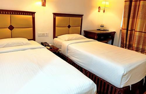 Oyo 90464 Borneo Suites Hotel