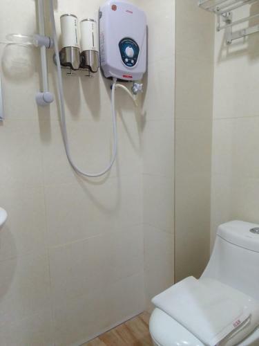 Oyo 90464 Borneo Suites Hotel