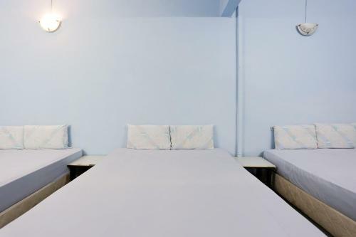 Spot On 89989 Wispering Hotel
