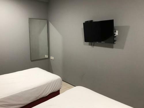 Oyo 90487 K Threegod Hotel