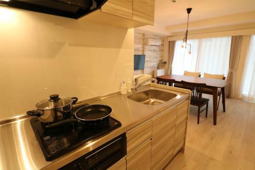 Apartamentos Grand Success Asabu II