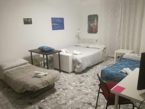 Hostal Welcome To The World - Rooms