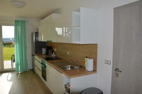 Apartm�ny Eva Ryne?ov�